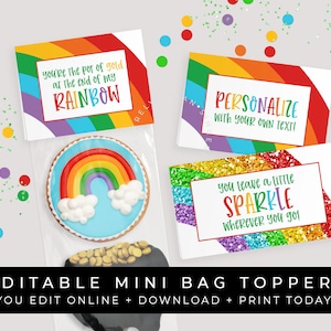 以下が含まれることがあります： 「You're the pot of gold at the end of my rainbow」「Personalize with your own text!」「You leave a little sparkle wherever you go!」というテキストが書かれた、編集可能な虹色のミニバッグトッパーです。