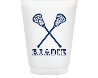 May include: White plastic cup with a navy blue lacrosse stick design and the word "ROADIE" printed on the front.