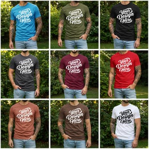 Puede incluir: Nueve camisetas de diferentes colores, cada una con el texto "Your Design Here" en una fuente estilizada. Las camisetas son de varios colores, incluyendo azul, verde, negro, gris, burdeos, rojo, marrón y blanco. Las camisetas son de manga corta.