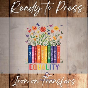 May include: A colorful iron-on transfer featuring a design with books and flowers. The books are labeled with words like "Love," "Equality," and "Hope." Butterflies and flowers in various colors are above the books. The text "Ready to Press" and "Iron on Transfers" are also present.