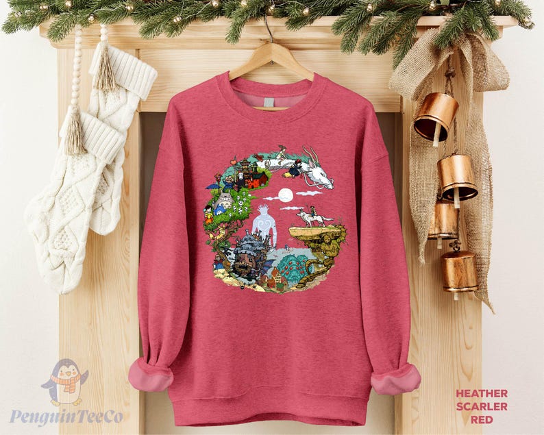 A red sweater with a colorful graphic design hangs on a wooden hanger, surrounded by Christmas stockings and ornaments.