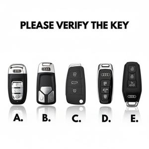 K&ouml;nnte beinhalten: Abbildung von f&uuml;nf schwarzen Autoschl&uuml;sseln mit silbernen Akzenten, beschriftet mit A bis E. Der Text "PLEASE VERIFY THE KEY" steht oben. Jeder Schl&uuml;ssel hat eine andere Tastenanordnung und ein anderes Design.