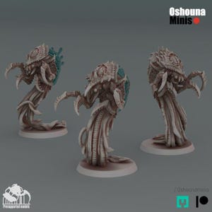 May include: Three beige miniature alien figures with detailed exoskeletons, sharp claws, and tentacle-like bodies. Each figure is mounted on a circular base. The figures have a teal accent on their backs. The image includes the text "Oshouna Minis".