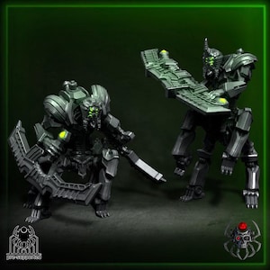 May include: A set of three ceramic nesting bowls in varying sizes. The bowls have a speckled, matte finish in cream, light grey, and dark grey. Each bowl is rounded with a slightly flared rim.