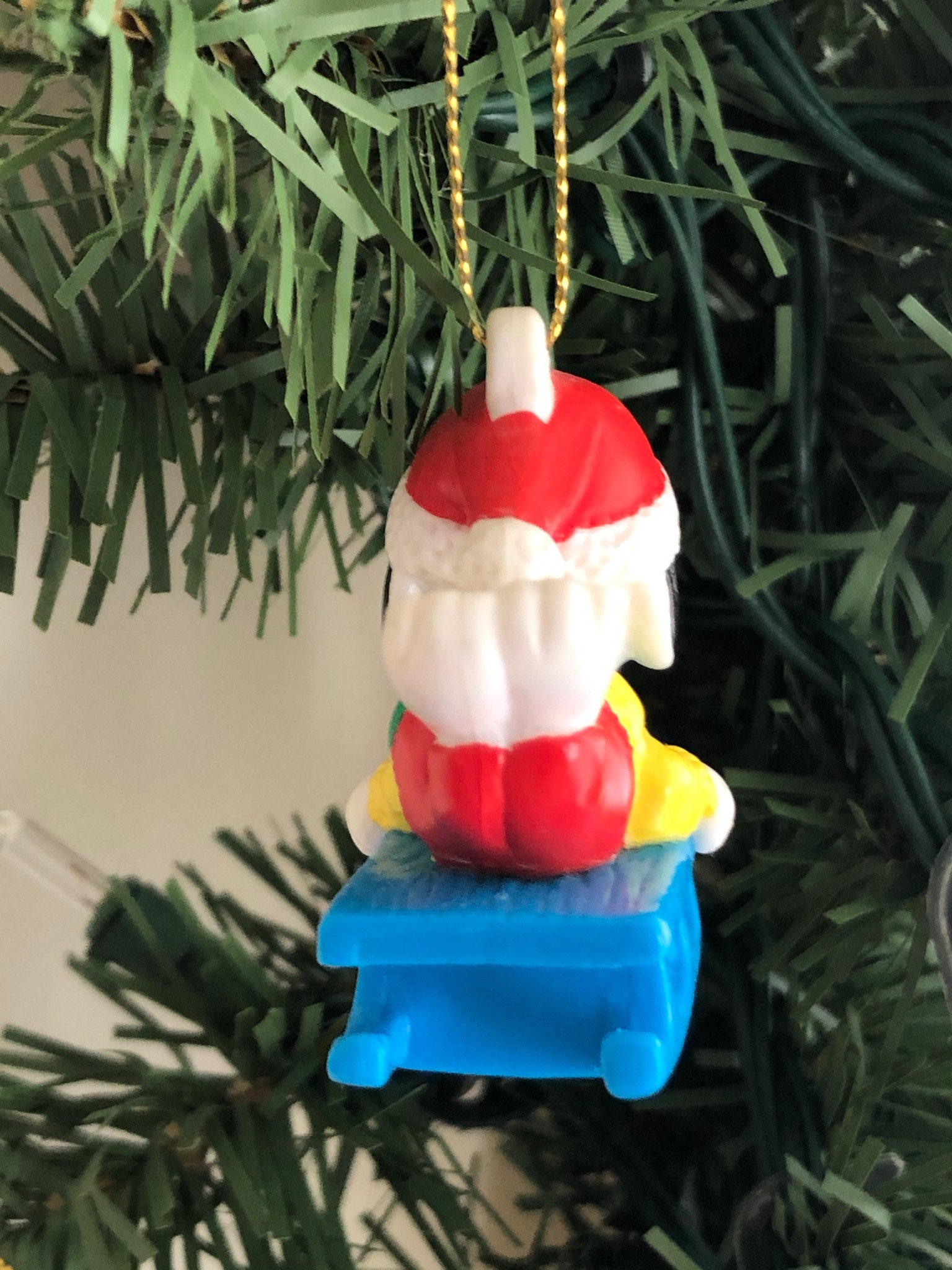 そりに乗ったヴィンテージのスヌーピーのクリスマスオーナメント そりに乗ったヴィンテージのスヌーピーのクリスマスオーナメント