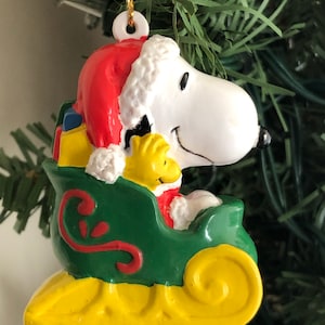 Vintage Santa Snoopy and Woodstock in Sleigh Christmas PVC Ornament