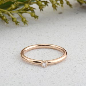 Dainty 0.02 CTW Diamond Solitaire Ring: Bezel Set Solid Gold