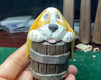 hand carved wooden dog in barrel