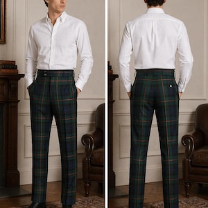 May include: A white button-down shirt paired with green, blue, and red plaid trousers. The trousers have a high waist and a tailored fit. The outfit is completed with black dress shoes. The image shows the front and back of the outfit.