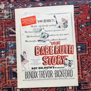 May include: A vintage movie poster for "The Babe Ruth Story" starring William Bendix, Claire Trevor, and Charles Bickford. The poster features a black and white photo of Babe Ruth in a baseball uniform, along with a red and white title card.