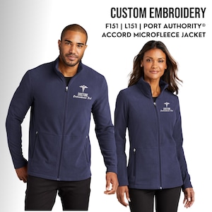 May include: Two navy blue microfleece jackets with a zipper closure and a custom embroidered medical symbol and text that reads "CUSTOM Embroidered Text".