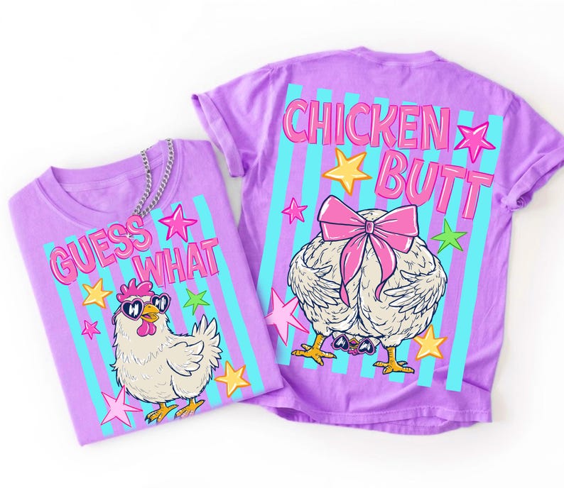 May include: Two purple t-shirts with chicken-themed graphics. One shirt says "GUESS WHAT" with a cartoon chicken wearing sunglasses. The other shirt says "CHICKEN BUTT" with a chicken's rear end and a pink bow. Both shirts have blue and pink stripes.