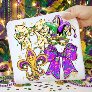 May include: White square fabric featuring Mardi Gras themed designs. Includes a gold fleur-de-lis, purple and gold bows, a jester hat, and a mask. The designs are in purple, green, and gold, with decorative beads and confetti.