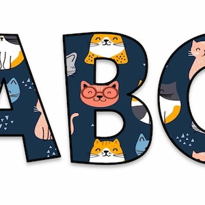 May include: The letters "ABC" are displayed in a playful font, each filled with a navy blue pattern of various cat faces. The cats are in shades of orange, pink, gray, and white, with some wearing glasses. The letters have a black outline.