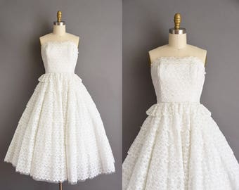 White eyelet cotton strapless 50s bridal wedding dress. 1950s vintage dress