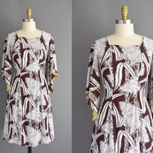 1950s dress | Paka Muu Hawaiian brown rayon novelty print angel wing sleeves tiki party dress | Small