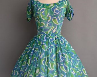 Vestido vintage de los años 50 / Julis Garfinckel & Co. Vestido de algodón con estampado abstracto / Grande