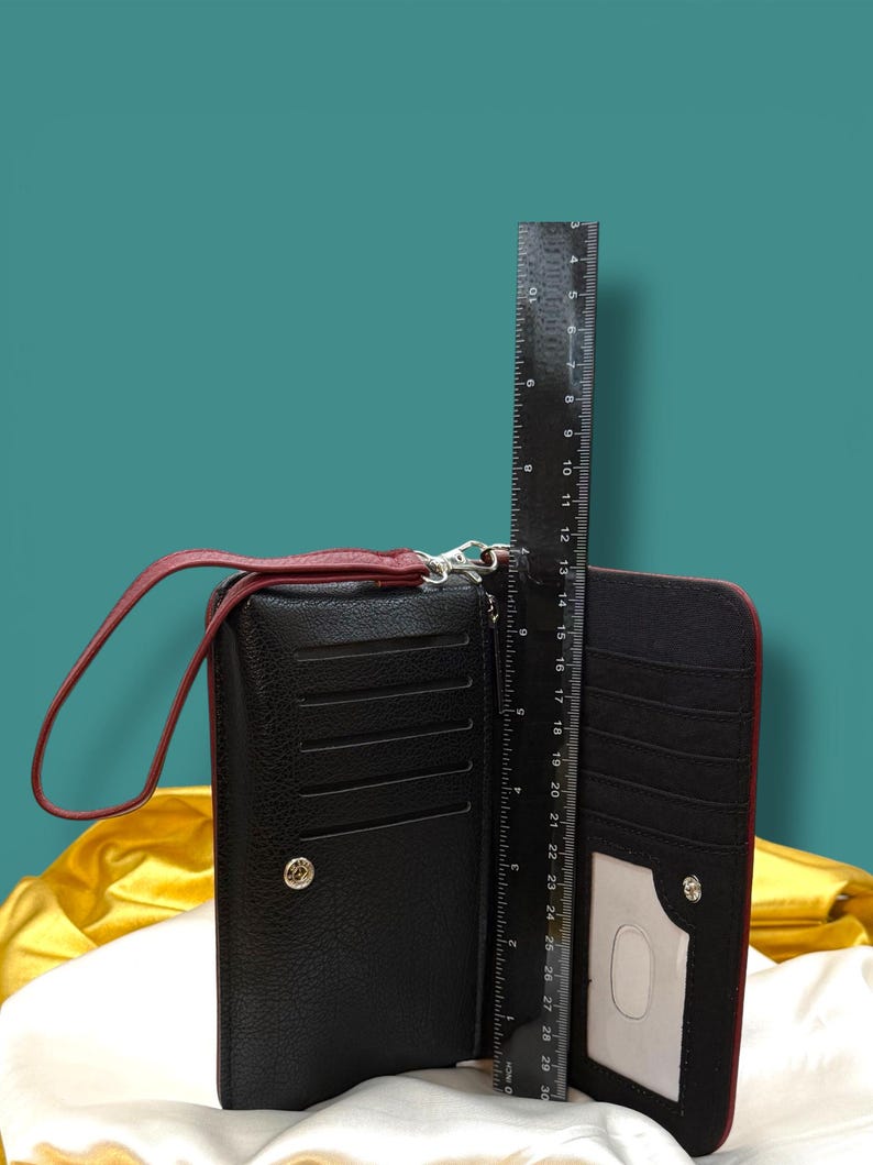 Interior view of Little Women wallet showing card slots and zip pocket with ruler to show height of approximately. 7 inches