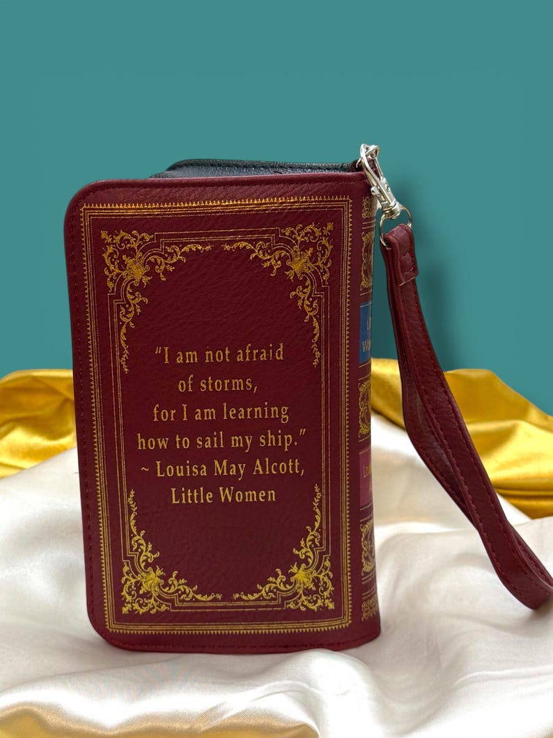Little Women book wallet back cover shown with quote from the story, "I am not afraid of storms, for I am learning how to sail my ship."  and as a book-style clutch