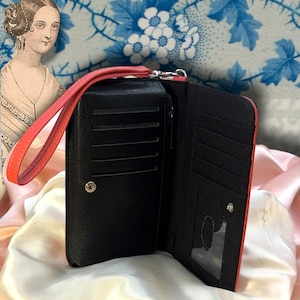 Close up of interior compartment of Jane Eyre book wallet, showing stitching detail and structured design