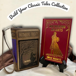Wuthering Heights book wallet displayed with matching ornate classic edition book on ivory satin, creating a romantic and moody literary pairing from the Classic Tales collection