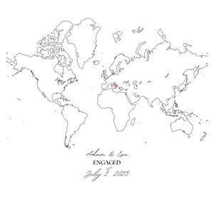 May include: A black and white outline of a world map with a pink dot marking a location in the Mediterranean Sea. The text "Adam & Eve ENGAGED July 1, 2025" is written below the map.