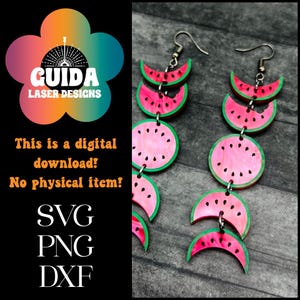 May include: A pair of watermelon-shaped earrings with green outlines. The earrings are made of pink and green acrylic and are hanging from silver hooks.