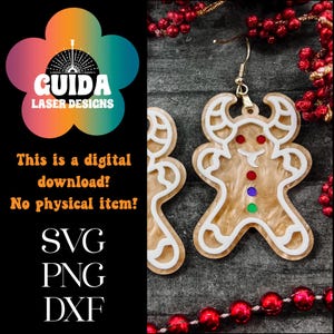May include: Gingerbread man earrings with white accents and colorful details. The earrings are on a gold hook. The image also includes the text "This is a digital download! No physical item!" and "SVG PNG DXF".