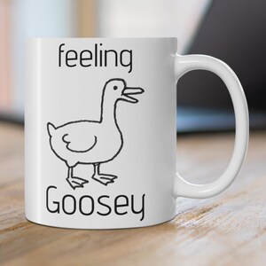 Feeling Goosey mug, funny mugs, funny mug gifts for mom, funny mug gifts for dad, funny dad joke mugs, dad jokes mugs, funny Goose mugs.