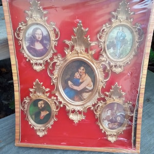 May include: A set of five framed miniature art prints. The frames are ornate, gold-colored, and oval-shaped, set against a red background. The prints depict classic art pieces, including the Mona Lisa and other portraits. The set is packaged in clear plastic.