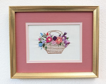 Vintage borduursel bloemenmand