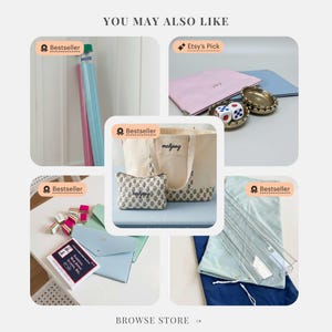 May include: A collection of various items, including a tote bag and a cosmetic bag with the word "mahjong" printed on them. Other items include dice, a pink pouch, and a blue pouch. The image also features a set of clear rulers and a set of pink and blue sticks.