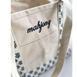 Game Tile Carrier Mahjong Tote Bag Matching Pouch Set Canvas Cotton Blend Block Print Design Embroidered Script Detail Top Zip Closure Front Pocket Feature Heavy Duty Construction Stylish Player Accessory Practical Organization Solution