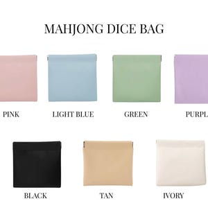 May include: A selection of Mahjong dice bags in various colors, including pink, light blue, green, purple, black, tan, and ivory. Each bag is square-shaped with a folded top. The text "MAHJONG DICE BAG" is displayed above the bags.