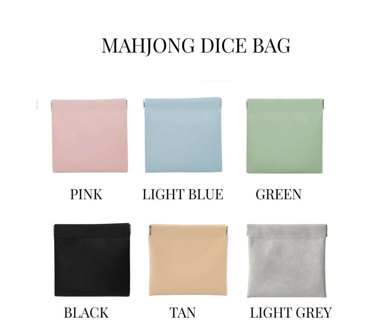 May include: A collection of six square Mahjong dice bags in various colors: pink, light blue, green, black, tan, and light grey. Each bag is labeled with its respective color name.