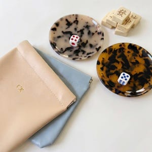 Tortoiseshell Pattern Resin Dice Dish Mahjong Game Set With Custom Monogrammed Leather Pouch Gold Foil Embossed Personalization Glossy Speckled Design Premium Quality Materials Elegant Storage Solution Perfect For Game Night Enthusiasts
