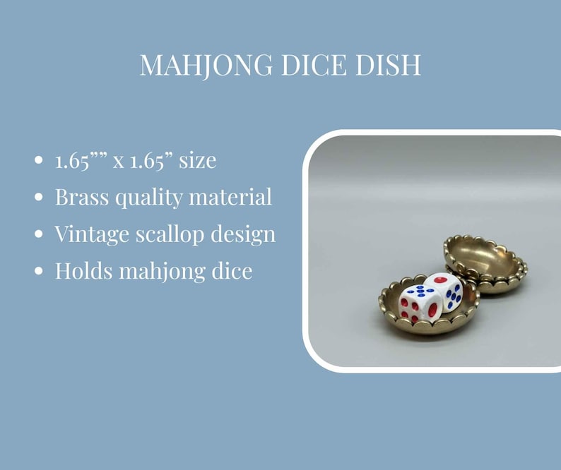 May include: A brass mahjong dice dish with a vintage scallop design. The dish is 1.65" x 1.65" and holds mahjong dice. Two dice with red and blue markings are visible inside the dish.