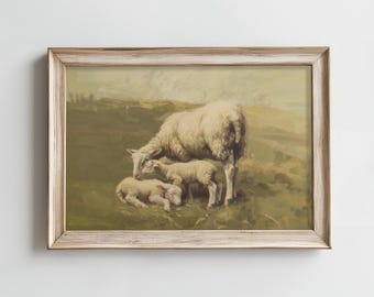 May include: A vintage framed print of a white sheep with two lambs in a grassy field. The print has a rustic, faded look and is framed in a light wood frame.