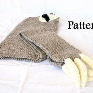 May include: Crocheted sloth pattern with a brown body, white claws, and black eyes. The pattern is laid out flat on a white surface. The word "Pattern" is written in black text on the right side of the image.