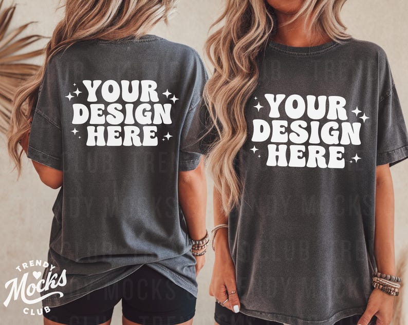 May include: An oversized dark grey t-shirt with a white graphic that says "YOUR DESIGN HERE" in a retro font.