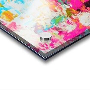 May include: An abstract painting on an acrylic panel featuring thick, textured impasto brushstrokes in vibrant shades of hot pink, bright yellow, turquoise blue, and white. The composition displays a high-gloss finish with a silver mounting bolt.
