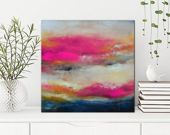 May include: Abstract painting with vibrant colors. The artwork features a blend of pink, orange, yellow, and blue hues, creating a dynamic and expressive composition. The painting is displayed on a white surface.