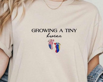 Maglietta con annuncio di nascita con doppia cittadinanza, bandiere venezuelane e americane