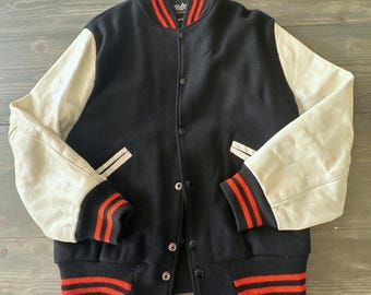 Chaqueta universitaria Nelson's de los años 60, azul marino, de lana y cuero, talla 42.