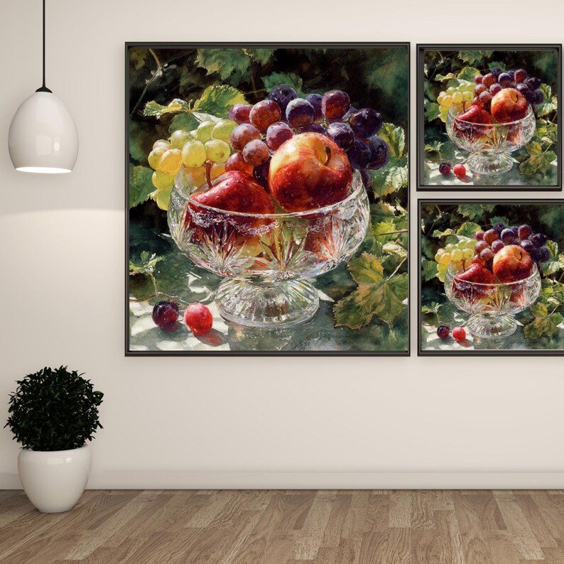 May include: A still life painting featuring a crystal bowl filled with red apples, green and purple grapes. The bowl is set against a backdrop of green leaves. The artwork is framed in a black frame.