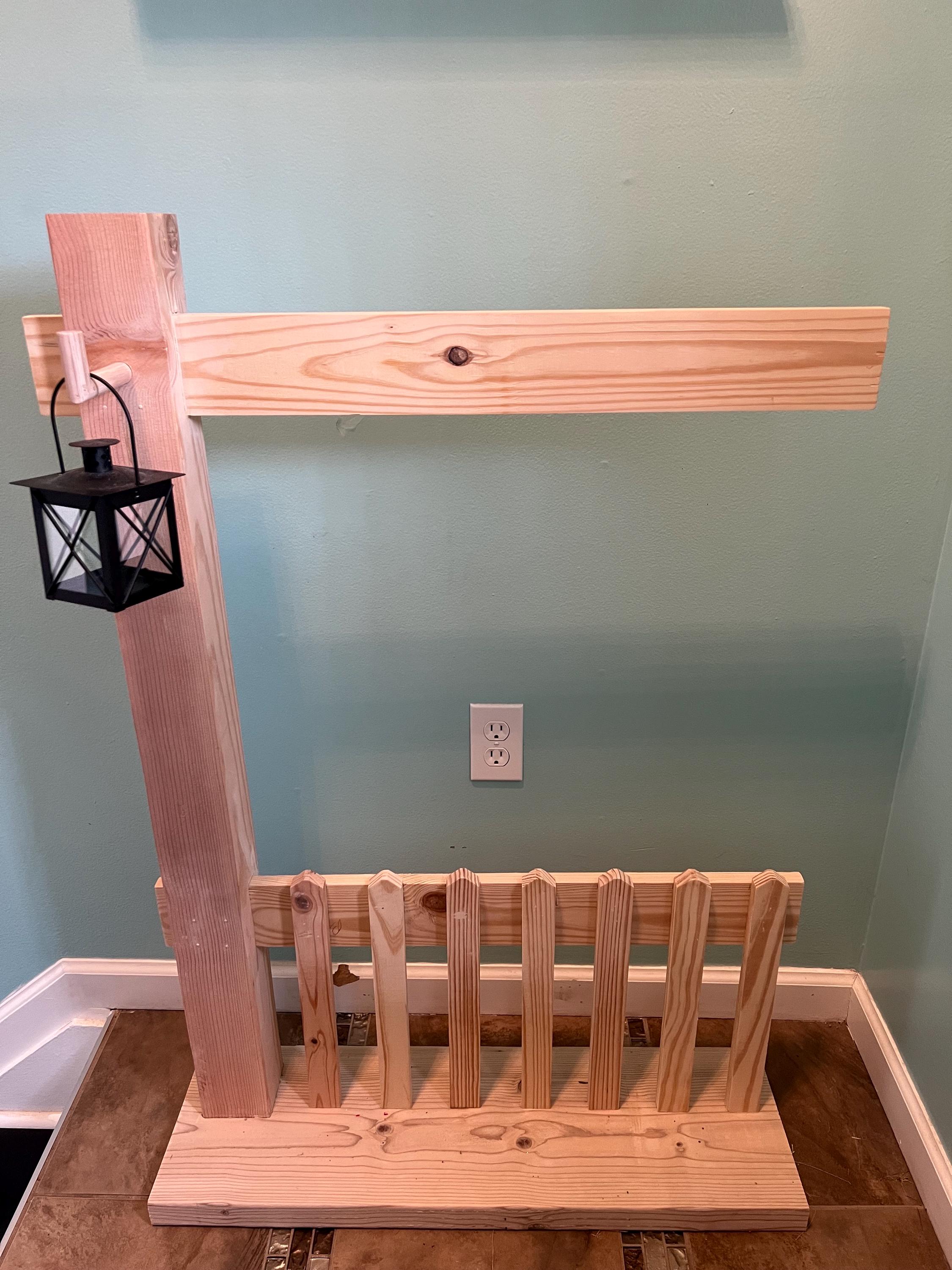 Picket fence welcome sign  with lantern