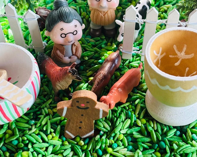 The Gingerbread Man Sensory Bin -  Book Inspired sensory kit with mix and loose parts.