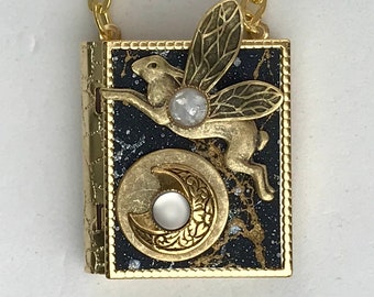 Miniature Book necklace - with a story about the moon inside and an antique gold flying rabbit cover design