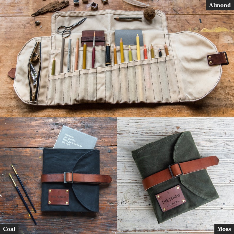 May include: A set of three canvas pencil rolls in almond, coal, and moss colors. Each roll has a leather strap with a metal buckle and a leather patch with the text "THE SENDAK PEG-AWL".