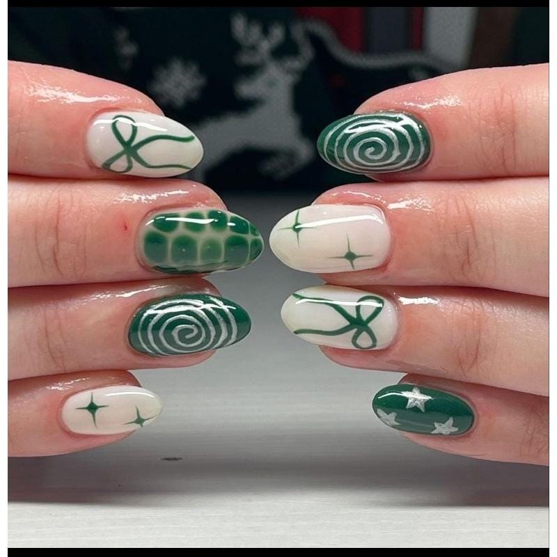 Playful Lop‑Sided Green Stencil Nails